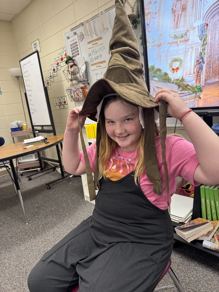 Mrs. Elbers 4th graders are doing Harry Potter for their read aloud and to celebrate, students got to try on a "Sorting Hat" from the book!