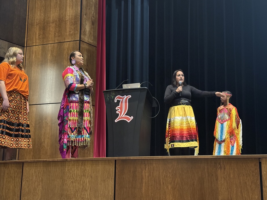 🌿 Honoring Native American Heritage Month in 5th Grade 🌿 A couple of weeks ago, our 5th grade reading classes had the privilege of welcoming special guest speakers from the Luverne American Indian Parent Advisory Committee (AIPAC) after they had wrapped up the novel study of The Birchbark House. We are incredibly grateful to AIPAC Chair Sue Arpan Wallace, AIPAC Secretary Josie Xaisongkham, and students Aubrie Timmer and Chance Xaisongkham for sharing their time, knowledge, stories, and personal experiences with us. Their insights brought deeper meaning to the different Native American cultures and history we’ve been learning about throughout the novel. A highlight of the visit was watching Josie perform the Jingle Dance, a beautiful and meaningful dance traditionally done for healing in many Pow Wow circles. Our students were engaged, respectful, and excited to learn from such generous community members. We are so appreciative of the opportunity to learn directly from local Native voices as we continue honoring Native American Heritage Month. Thank you again to our presenters for enriching our students’ understanding and helping make learning come alive. 🌟📚🧡