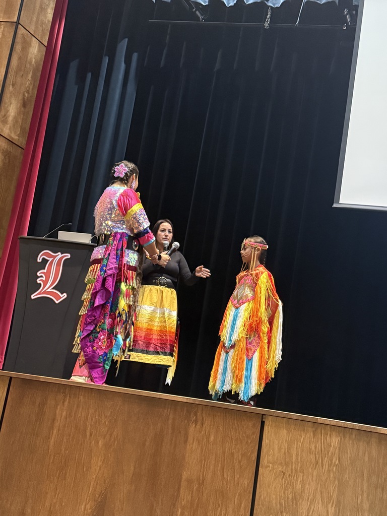 🌿 Honoring Native American Heritage Month in 5th Grade 🌿 A couple of weeks ago, our 5th grade reading classes had the privilege of welcoming special guest speakers from the Luverne American Indian Parent Advisory Committee (AIPAC) after they had wrapped up the novel study of The Birchbark House. We are incredibly grateful to AIPAC Chair Sue Arpan Wallace, AIPAC Secretary Josie Xaisongkham, and students Aubrie Timmer and Chance Xaisongkham for sharing their time, knowledge, stories, and personal experiences with us. Their insights brought deeper meaning to the different Native American cultures and history we’ve been learning about throughout the novel. A highlight of the visit was watching Josie perform the Jingle Dance, a beautiful and meaningful dance traditionally done for healing in many Pow Wow circles. Our students were engaged, respectful, and excited to learn from such generous community members. We are so appreciative of the opportunity to learn directly from local Native voices as we continue honoring Native American Heritage Month. Thank you again to our presenters for enriching our students’ understanding and helping make learning come alive. 🌟📚🧡