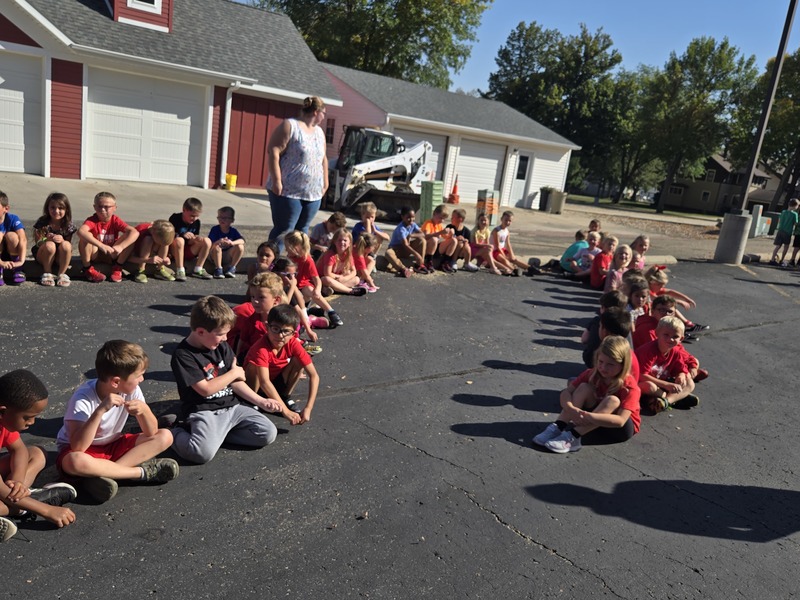 Students and staff wait for the all clear to return back to school.