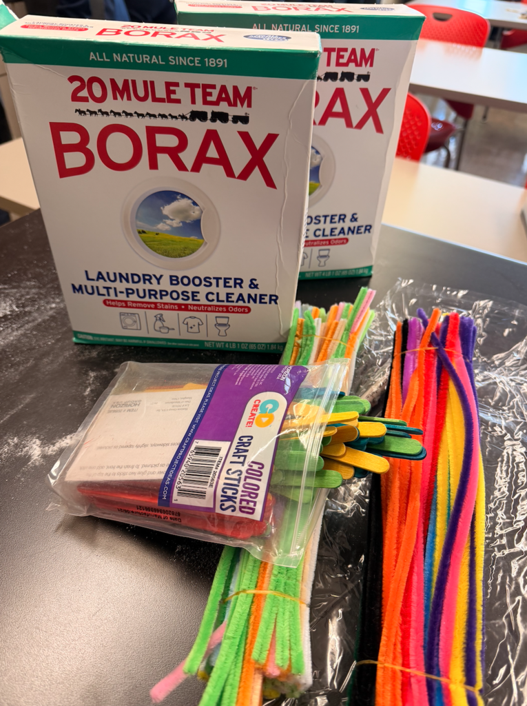 From unsaturated to supersaturated 🧪✨ Our chemistry students are growing borax crystals using hot water, pipe cleaners, and patience. Now we wait for the crystals to form! ❄️🔬 #STEM #ChemistryClass