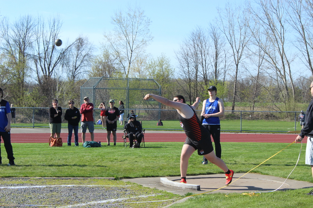 boy throwing shotput