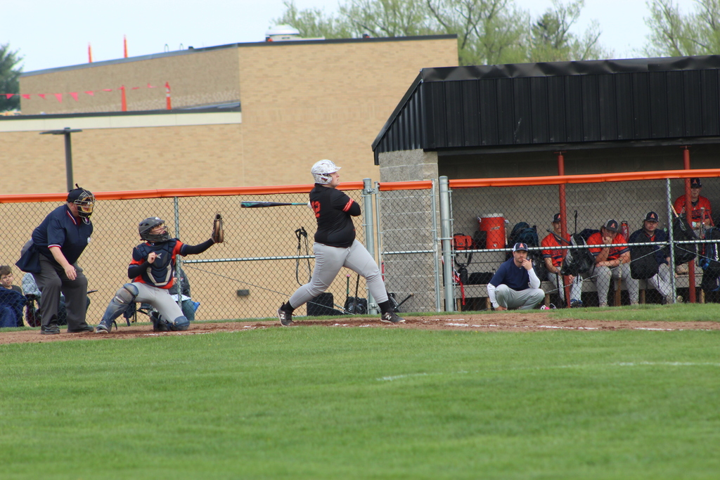 batter swinging at ball