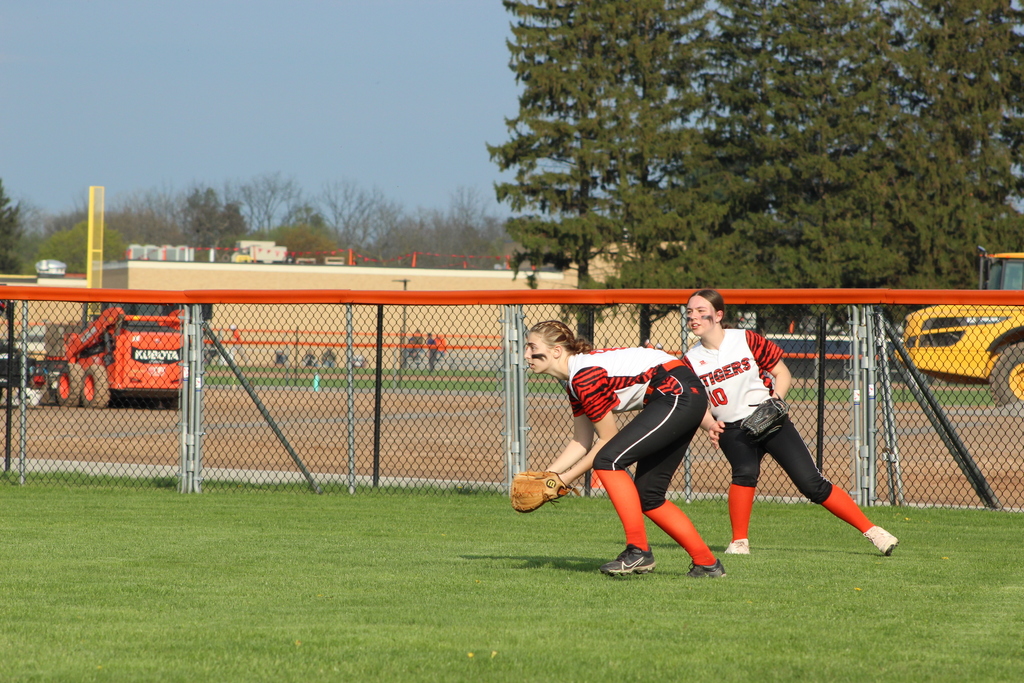 outfielders catching ball
