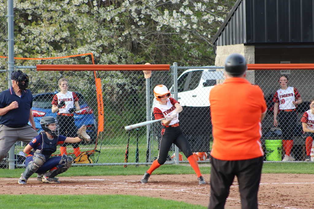 batter swinging at ball