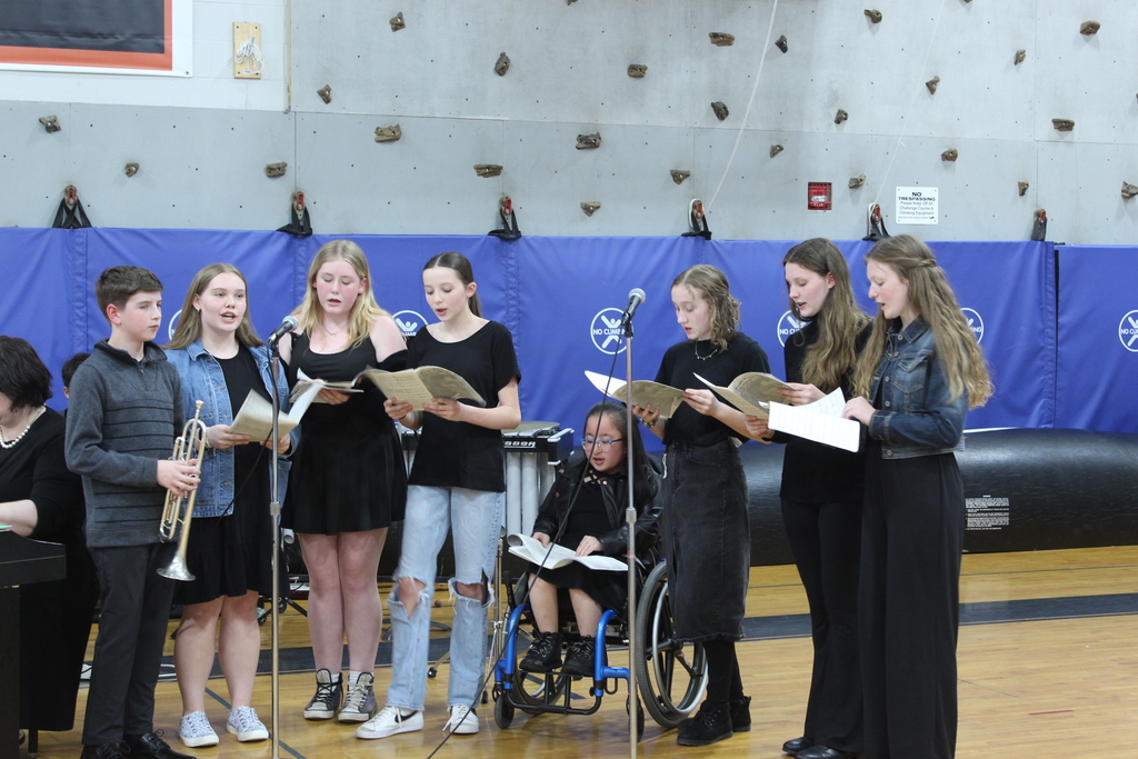 students singing together