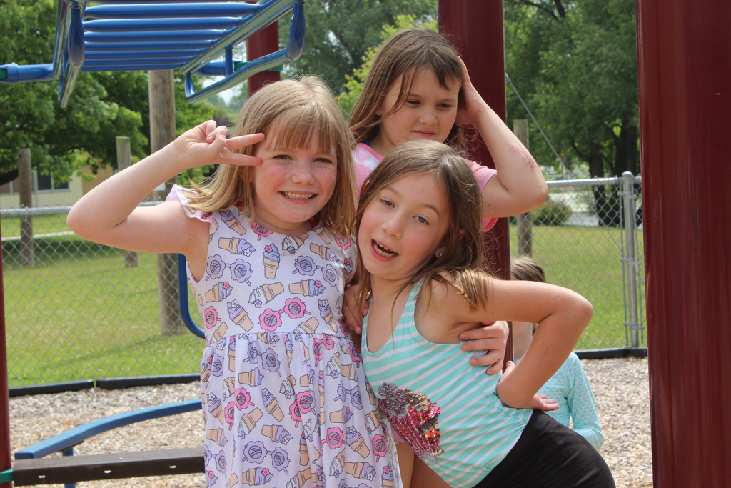 three girls posing for a photo