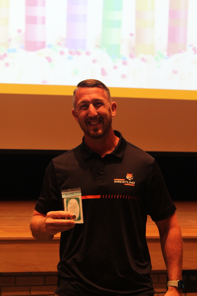 one teacher holding pin