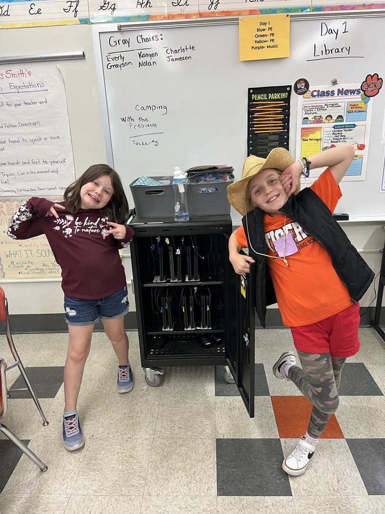 two students wearing outfits
