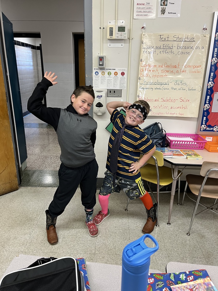 two boys wearing outfits