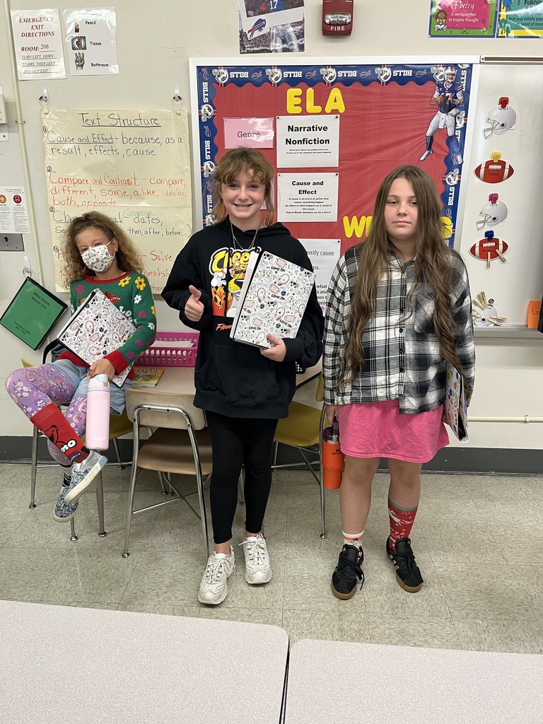 three students wearing outfits