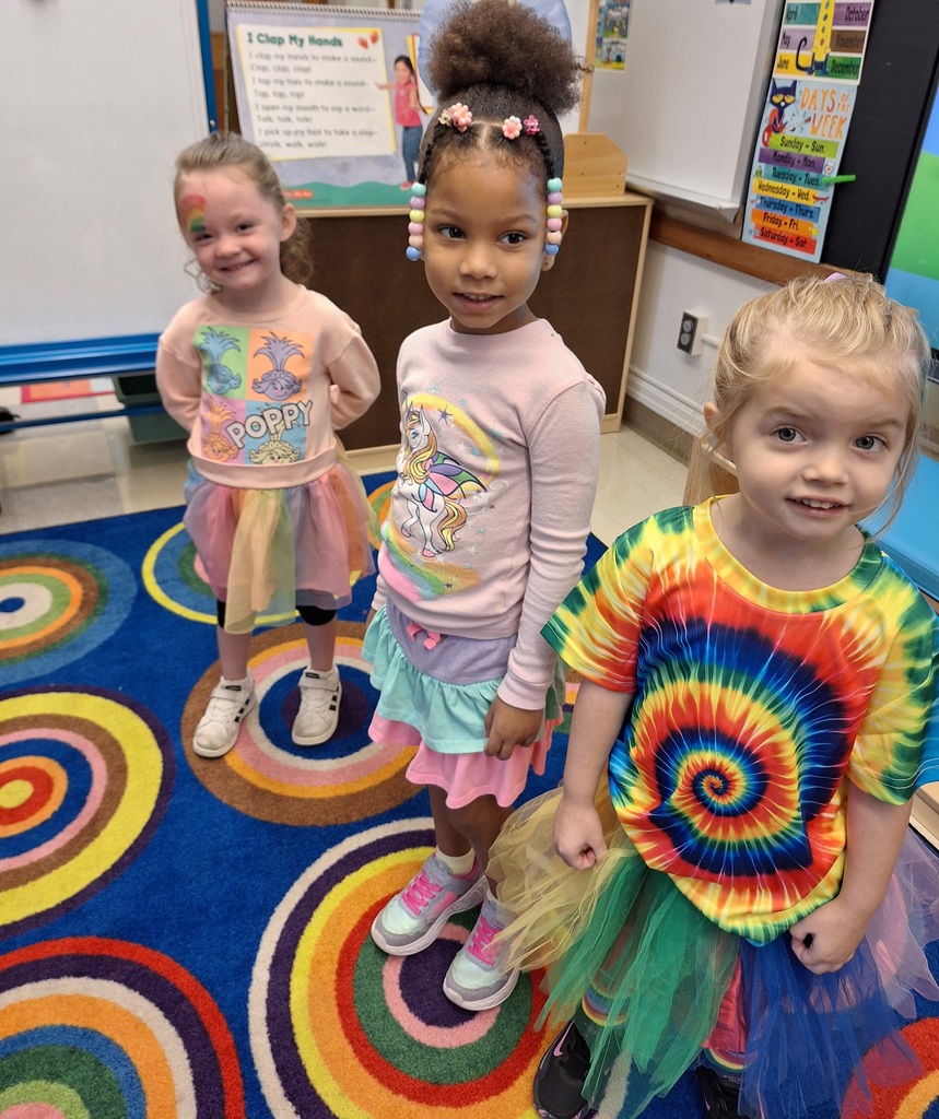 three girls wearing outfits