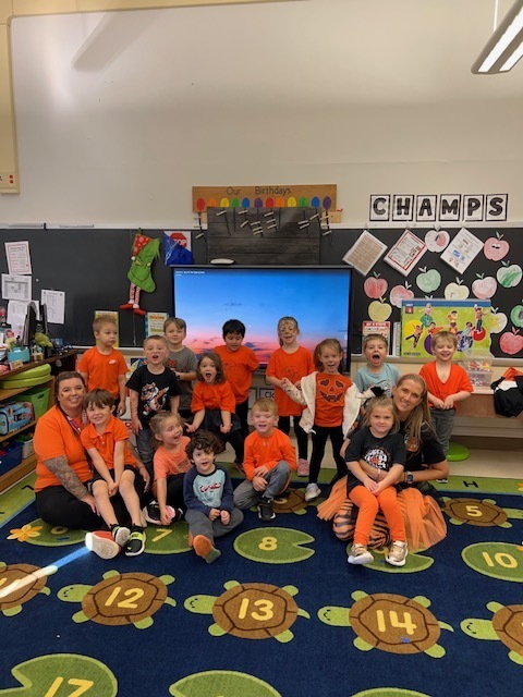 students and teacher in classroom