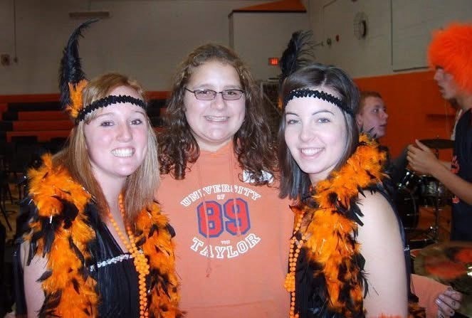 three students standing together