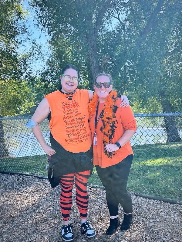 two teachers standing together