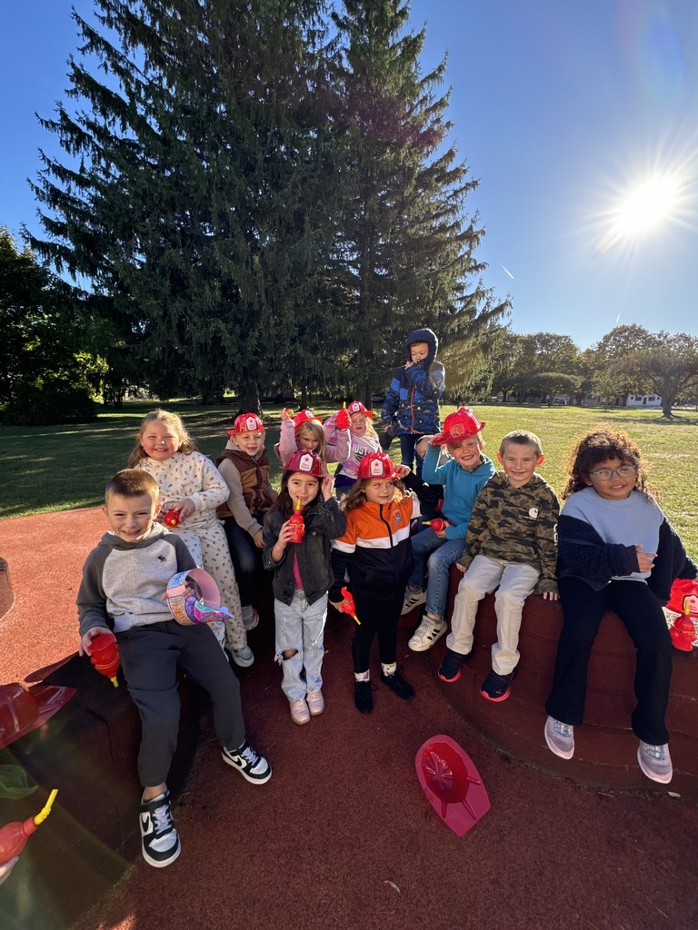 group of students sitting outside