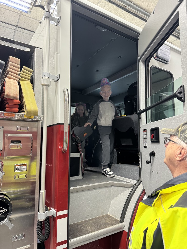 student in fire truck