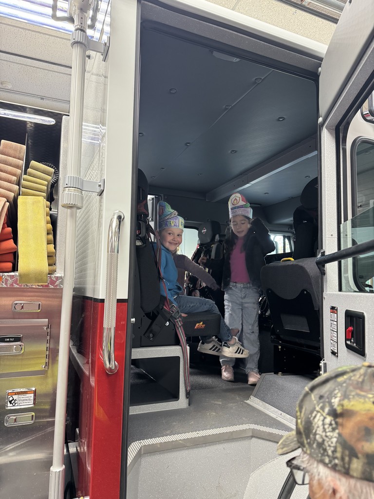 students in fire truck