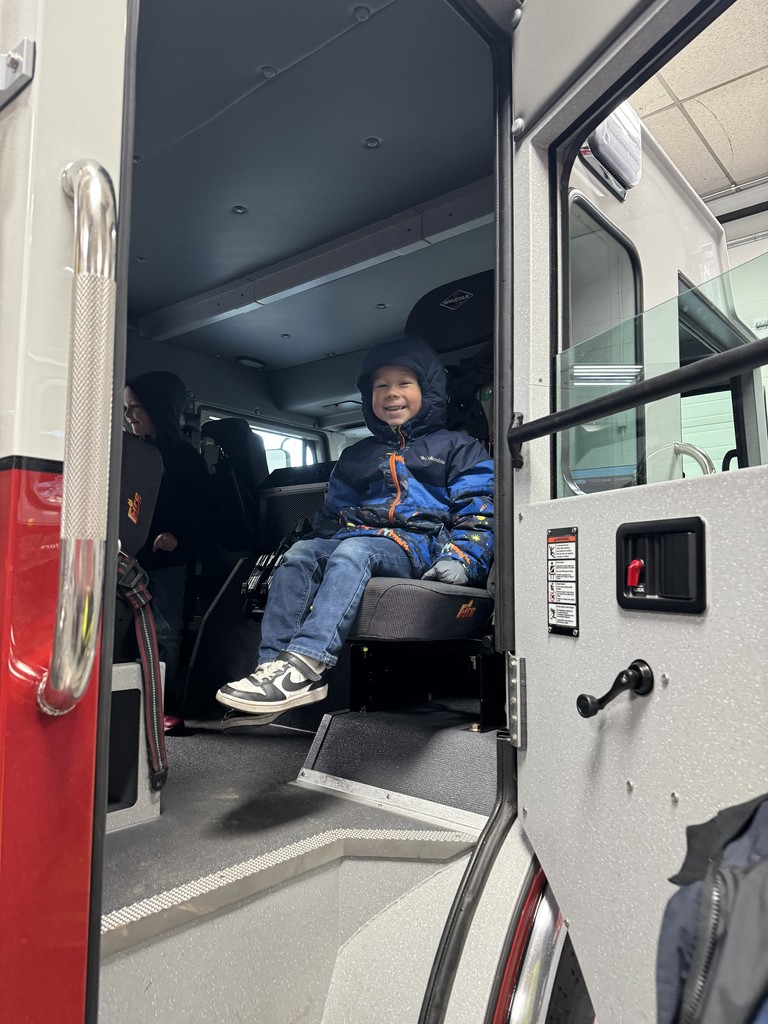 student in fire truck