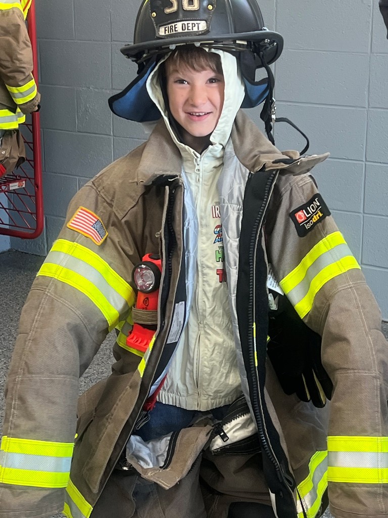 student in fireman gear