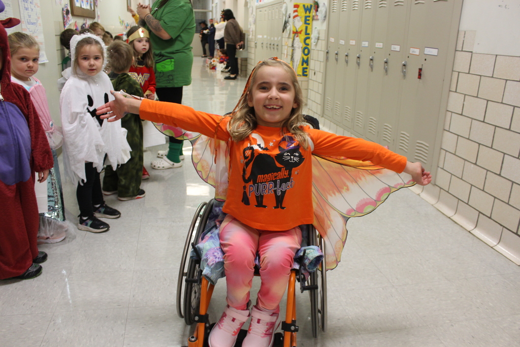 student in costume sitting in wheelchair