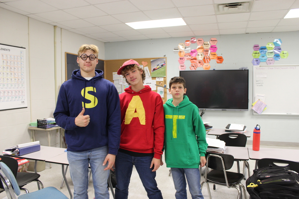 three students dressed as Alvin and the Chipmunks