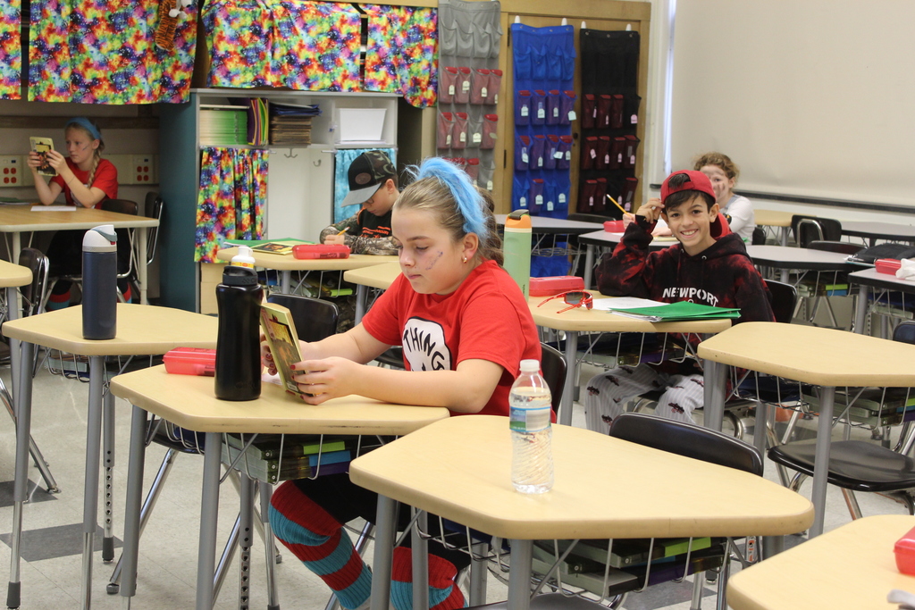 students in class in costumes