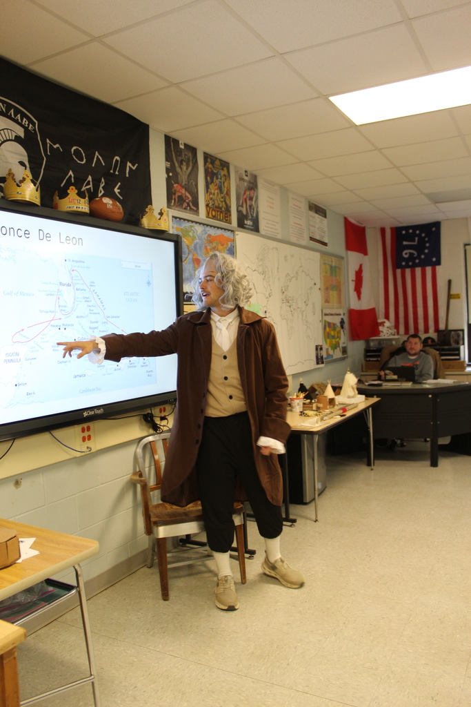 teacher teaching class in costume