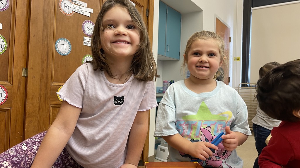 two girls sitting together