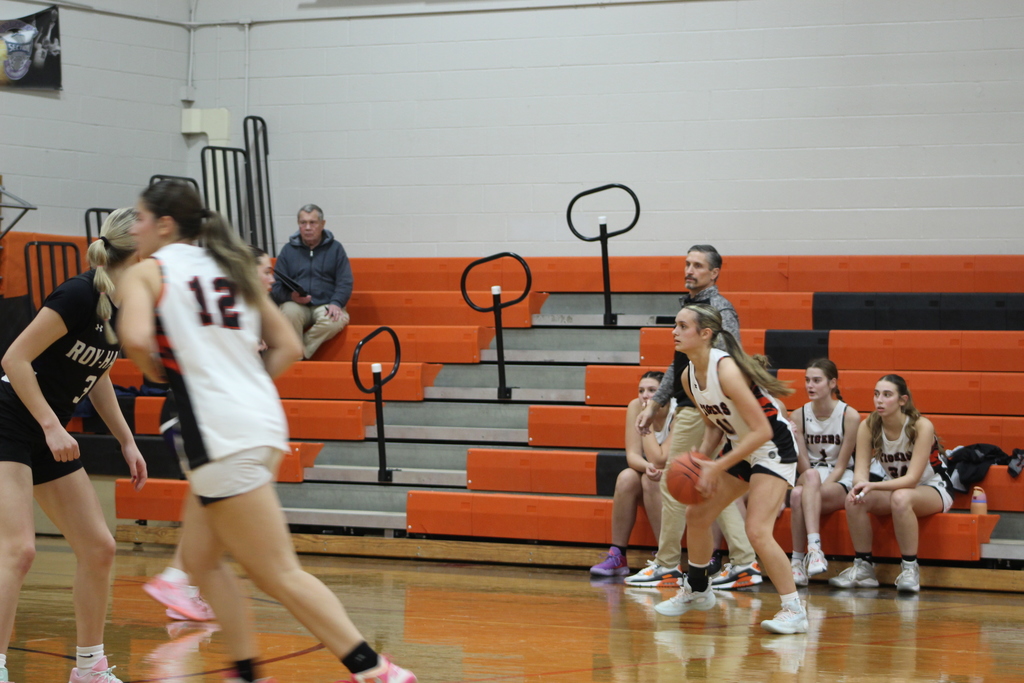 girls playing basketball in gym