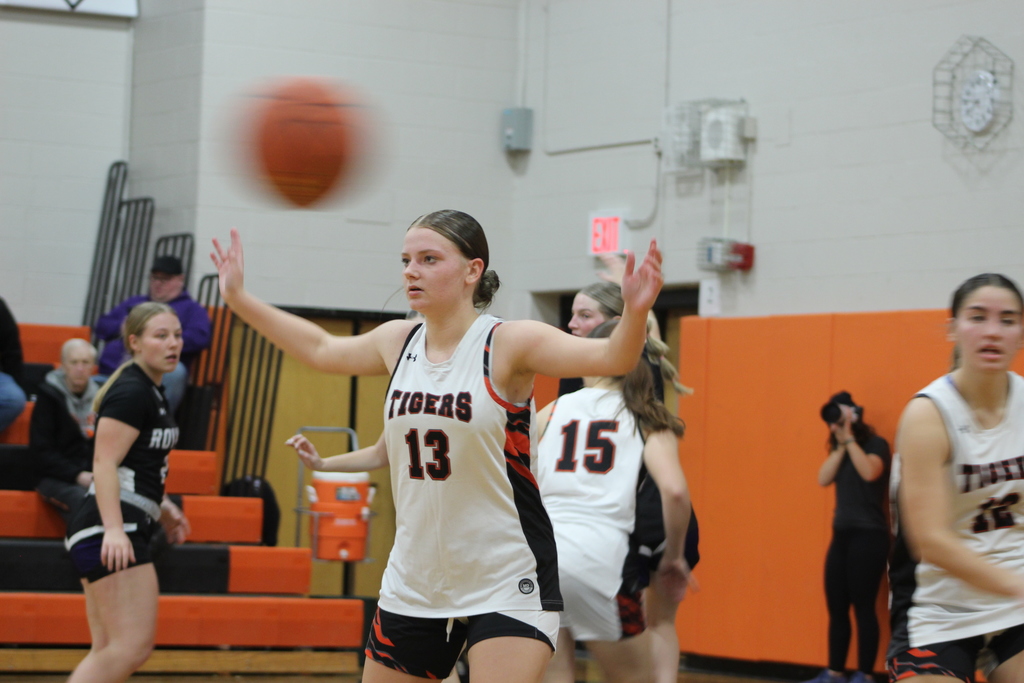 girls playing basketball in gym