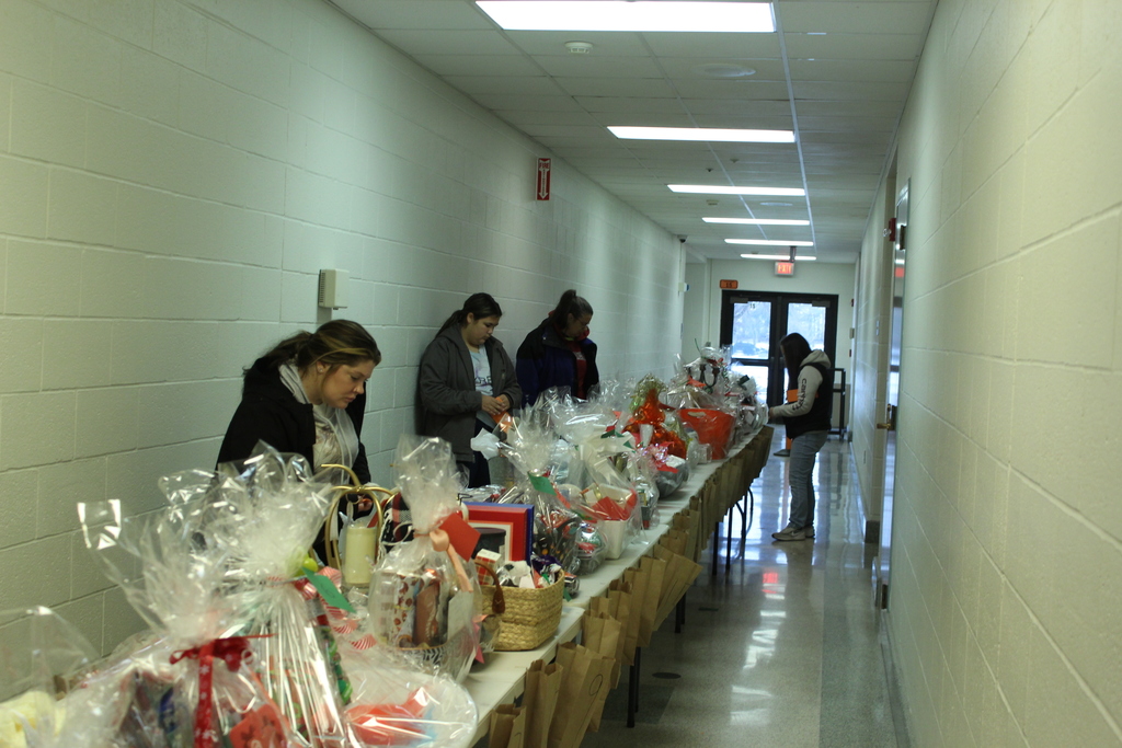people participating in basket raffles