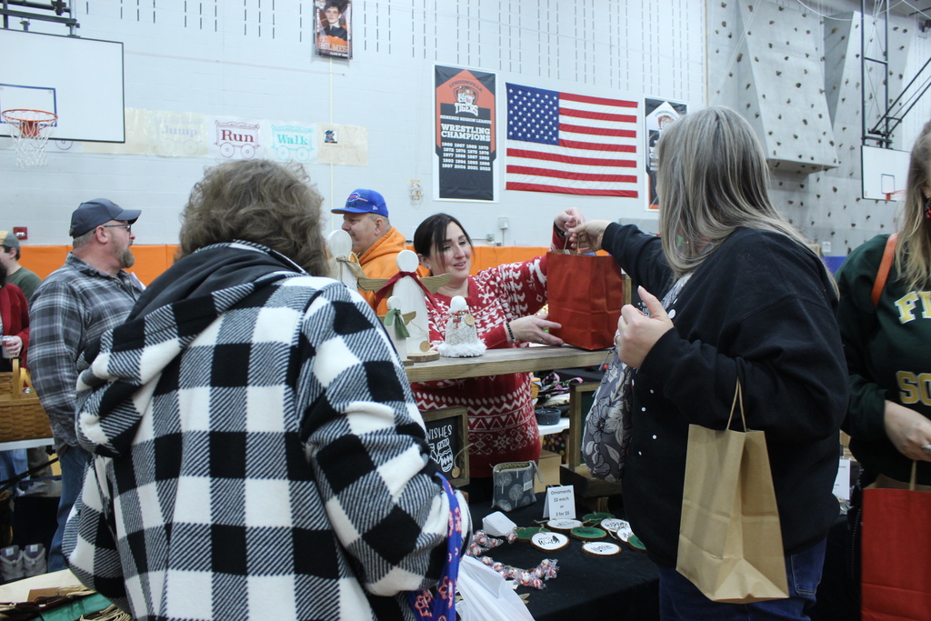 people shopping at booths
