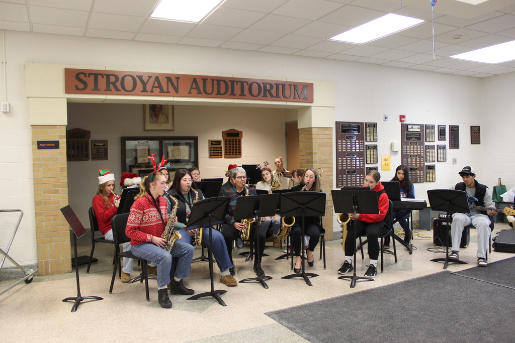 students and staff members playing in band