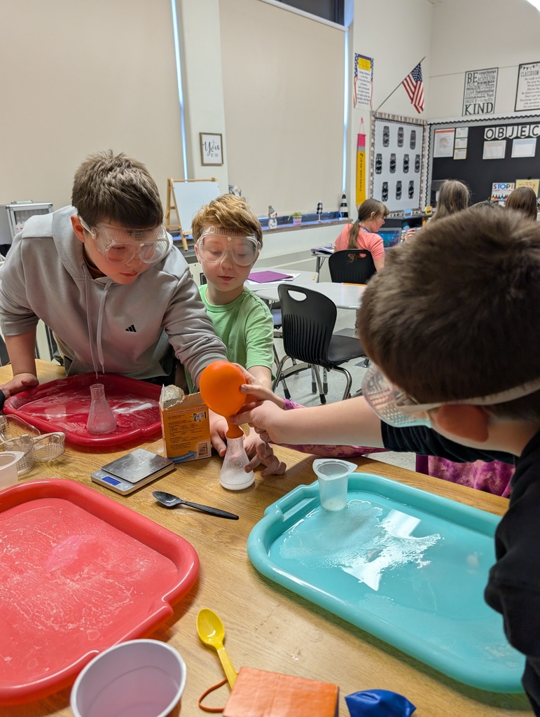 students working on a science experiment