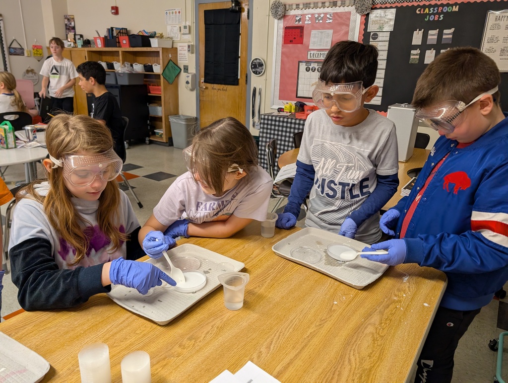 students working on a science experiment