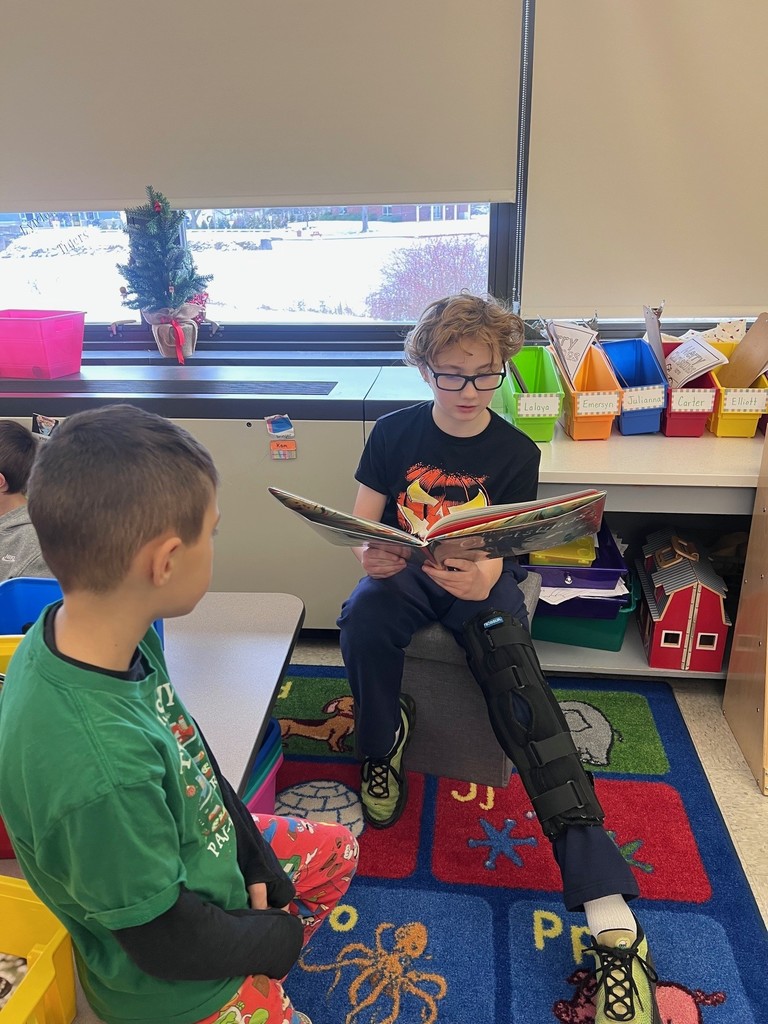 two students reading together