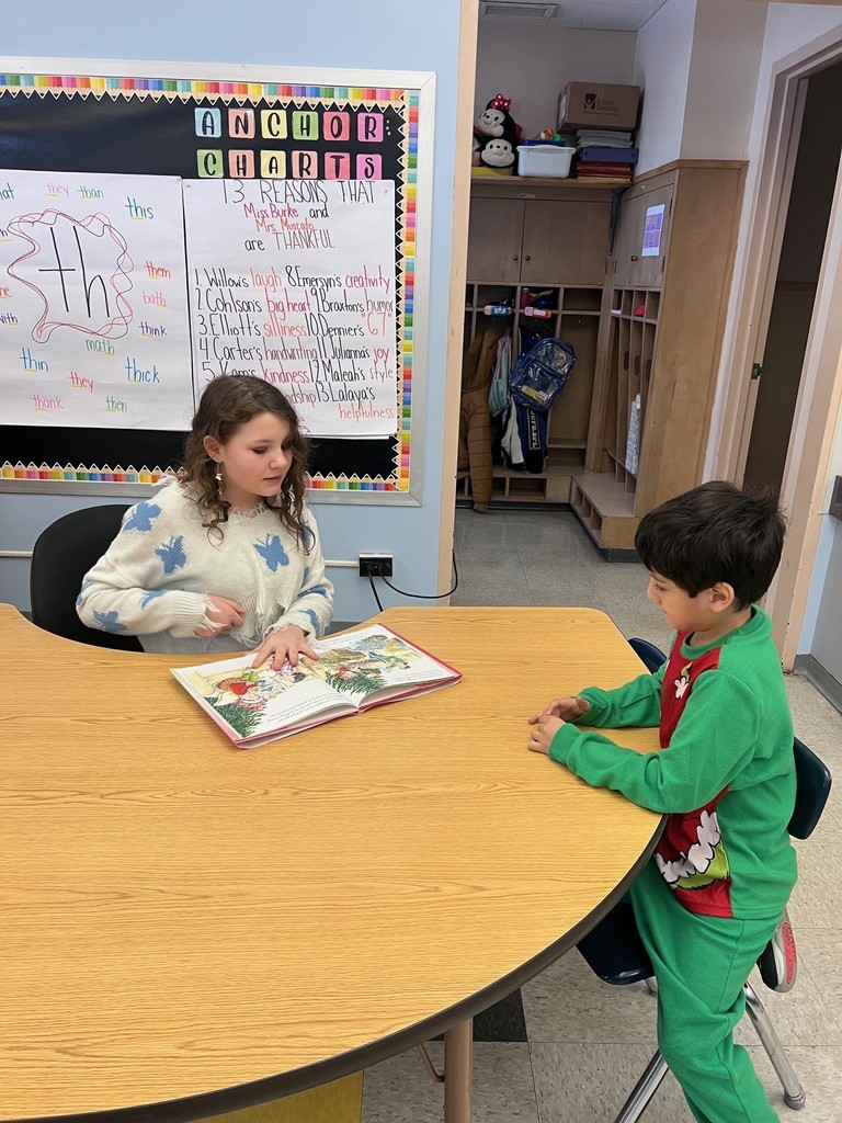 two students reading together