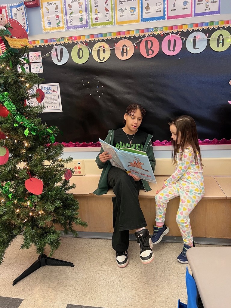 two students reading together