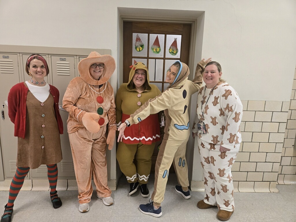 teachers dressed up in gingerbread clothing