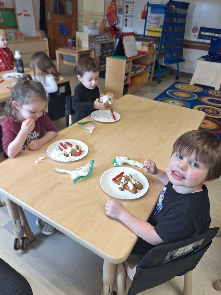 students with their gingerbread cookies