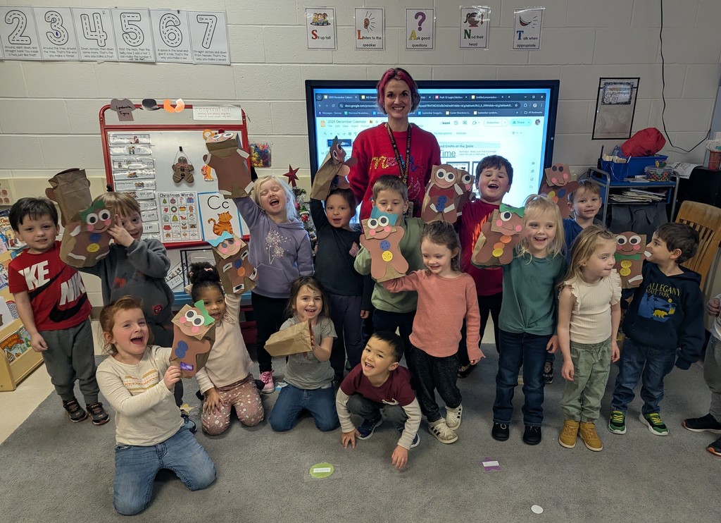 students with their teacher in the classroom