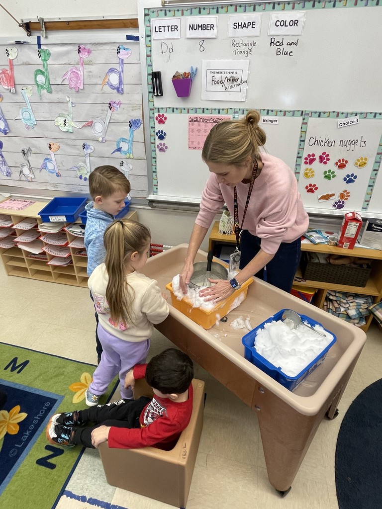 students making ice cream with teacher