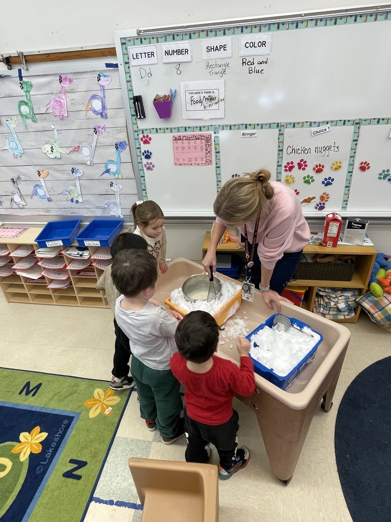 students making ice cream with teacher