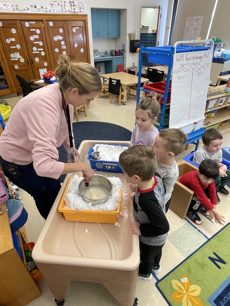 students making ice cream with teacher