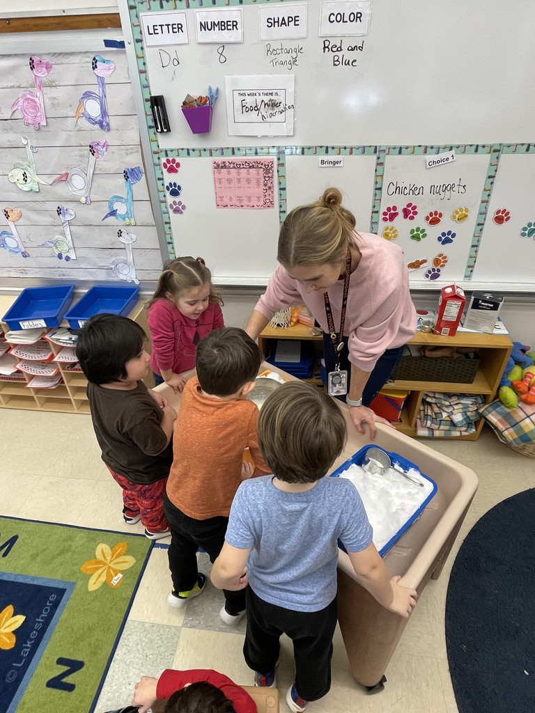 students making ice cream with teacher