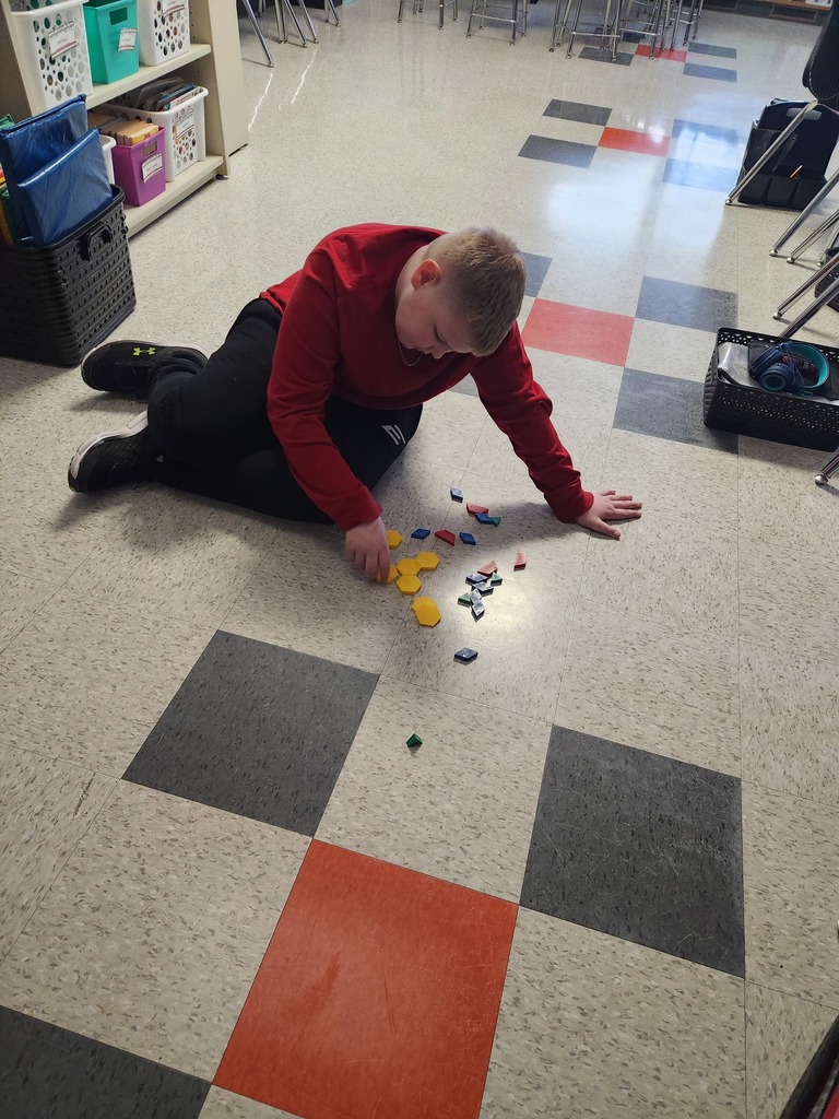 a student working on the floor