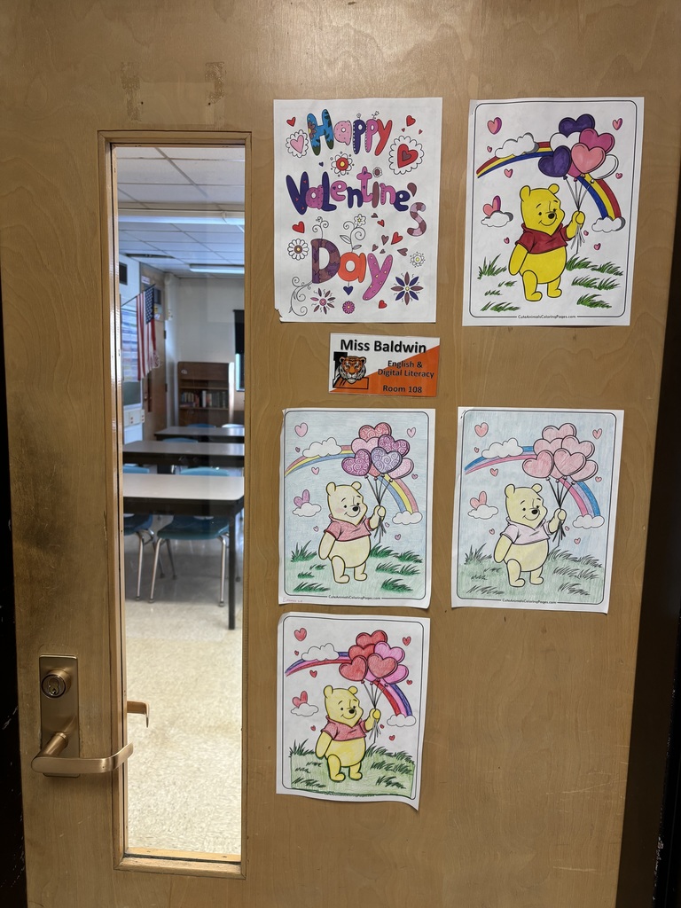door with coloring pages posted on it