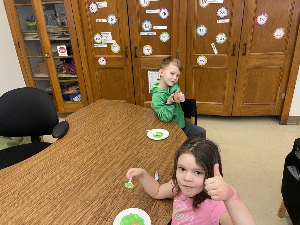 students eating food at tables
