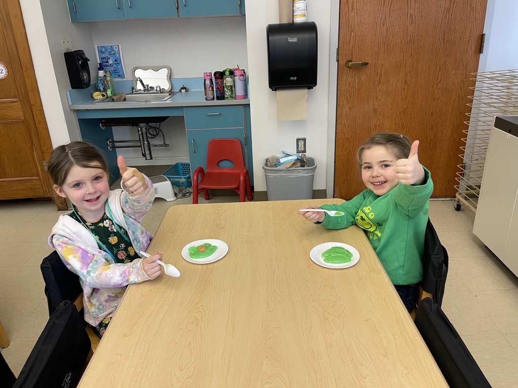 students eating food at tables